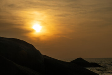 The morning landscape takes on a more dramatic impression in the presence of vibrant orange hues, adding a captivating touch to the picture.