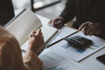 Business man group are meeting together in the office, they are meeting on the topic of finance and financial management, they are business partners. Concept financial management for startup companies