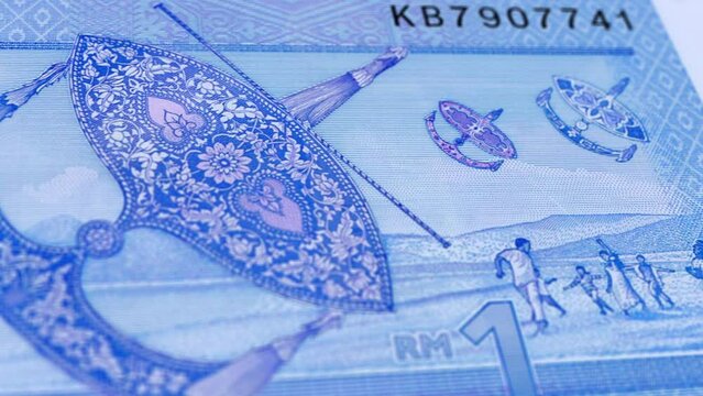 Malaysia Malaysian Ringgit 1 Banknotes, One Malaysian Ringgit, Close-up and macro view of the Malaysian Ringgit, Tracking and Dolly Shots 1 Malaysian Ringgit banknote Observe and Reserve