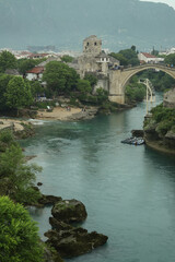 bridge over the river in town Mostar in the mountains