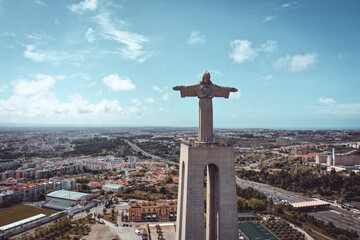 Landscape drone shot of the Christ king of Lisbon