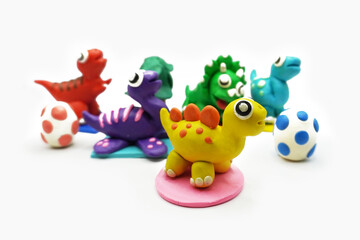 modeling clay, clay, dinosaur, animal, education, art, kid, white, colors, red, yellow, green, egg, tree, blue, purple