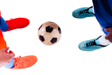 Football  player plays with soccerball in a match