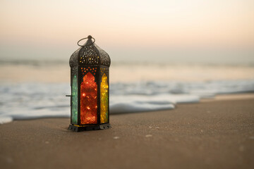 2024 Ramadan Kareem photo, Traditional Ramadan lantern lamp with ocean waves