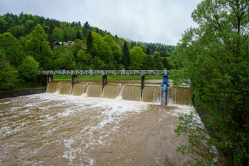 The dam on the Krempna reservoir during a water surge