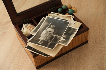 old photographs 1930, dear to heart memorabilia in vintage wooden box, stack of retro photos, vintage photographs, concept family tree, genealogy, memories, home archive, keep as keepsake