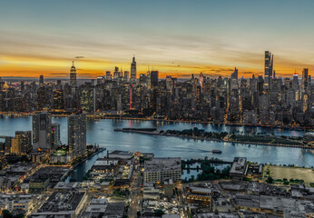 Aerial view of New York city skyline at sunset.