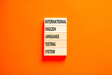 IELTS symbol. Concept words IELTS international english language testing system on wooden block....