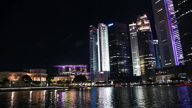 SINGAPORE - JANUARY 3, 2020: River cruise with skyline view at night
