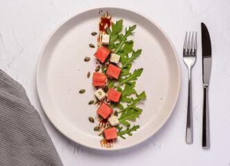 Food photography of salad, arugula, watermelon, cheese, feta, pumpkin seeds, balsamic, minimalism, leaf, organic, ingredient, vitamin, diet