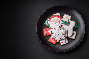 Delicious fresh colorful Christmas or New Year gingerbread cookies