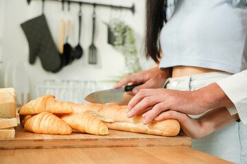 couple bake bakery together. sweet couple cooking together in home kitchen.