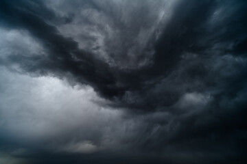 storm sky, dark dramatic clouds during thunderstorm, rain and wind, extreme weather, abstract background