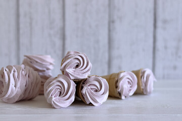 Zephyr in waffle cones. On boards painted white.