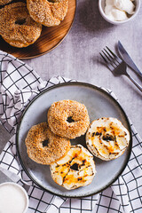 Sweet creme brulee bagels with cream cheese and caramelized sugar top and vertical view