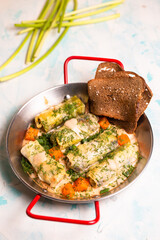 delicious cabbage rolls with a piece of rye bread