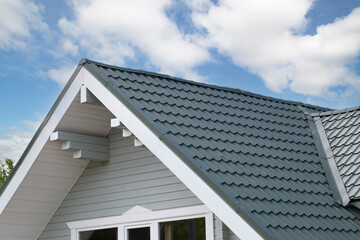 Metal tile.Roof for the house. Modern coatings for the roof of the house.