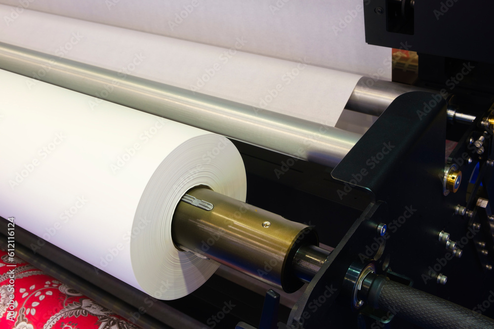 Poster rolls paper and fabric in wide industrial plotter