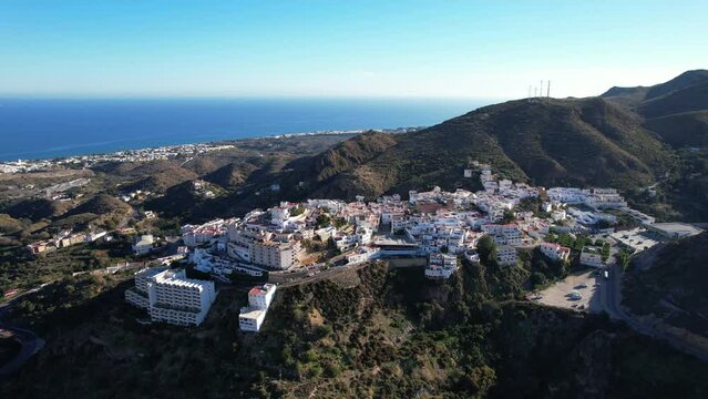 Aerial view above the beautiful Spanish village of Moj&aacute;car in Andalusia in southern Spain	