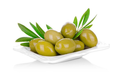 pickled green olives in a bowl and olive tree branch on a white background