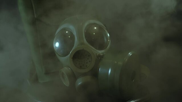 Gas mask with swirling smoke