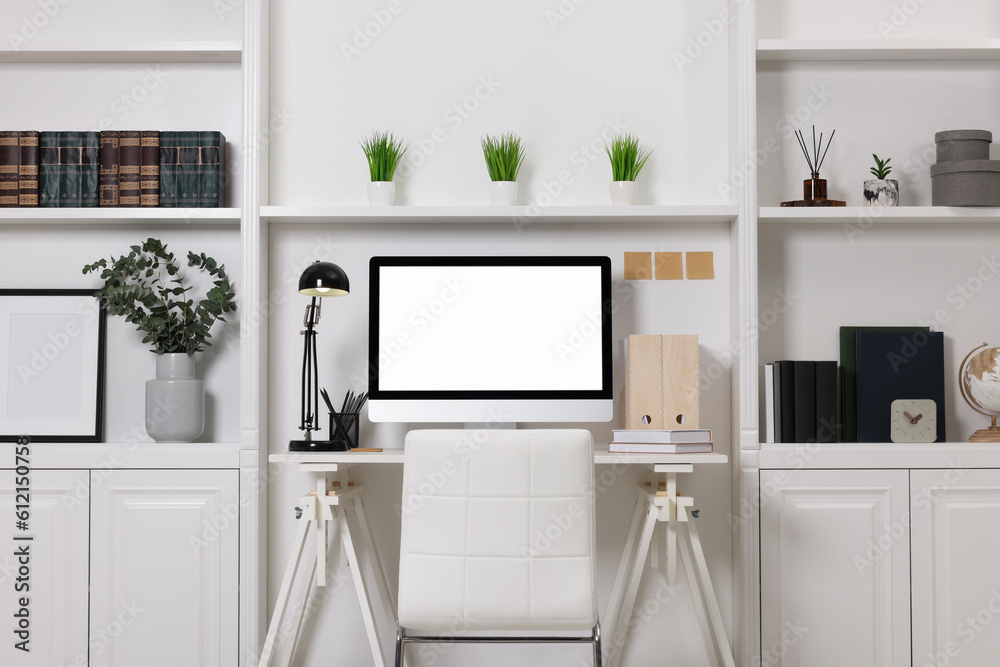 Sticker Cozy workspace with computer, lamp and stationery on wooden desk at home