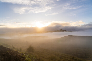 Panoramic sunrise with beautiful sun in the mountains