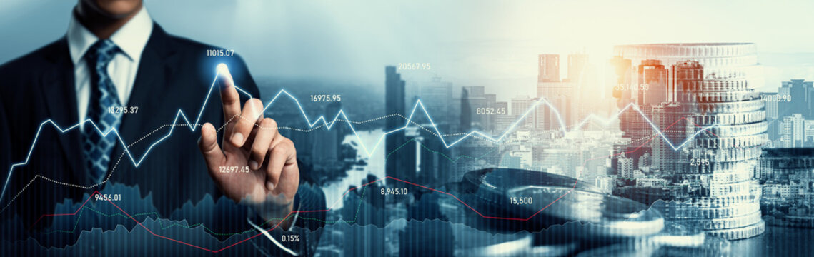 Businessman analyst working with digital finance business data graph showing technology of investment strategy for perceptive financial business decision. Digital economic analysis technology concept.