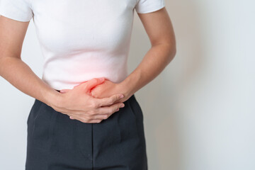 Woman having Stomach pain. Ovarian and Cervical cancer, Cervix disorder, Endometriosis, Hysterectomy, Uterine fibroids, Reproductive system, menstruation, diarrhea, digestive system and Pregnancy