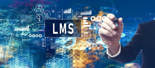 LMS - Learning Management System with businessman in a bokeh neon light trails city night background
