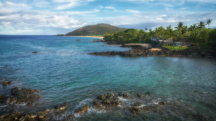 Aerial drone view over Makena Cove approaching Makena Beach in Kihei, on the island of Maui in...