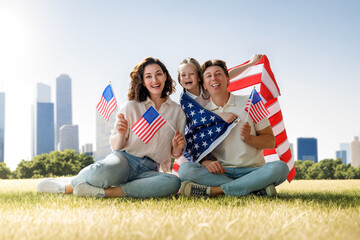 Patriotic holiday, family with American flag