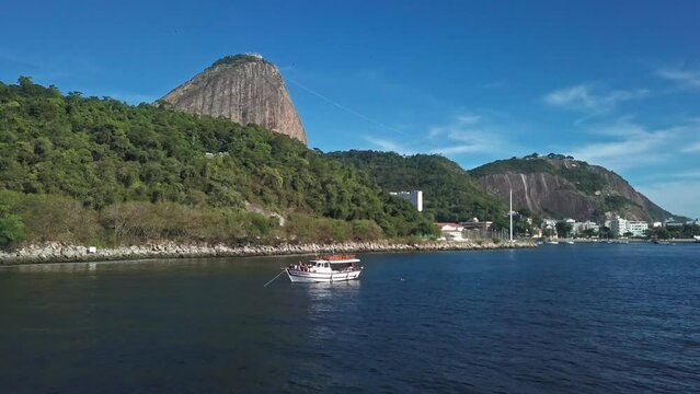 Aerial Shot of Sugarloaf Mountain and Boat in Guanabara Bay in Rio De Janeiro, Brazil. 4K Drone Footage