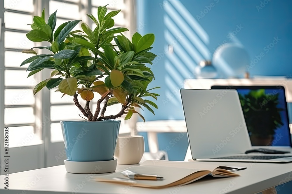 Wall mural Computer at the office, with a plant on the wooden table. Background of white and blue Generative AI