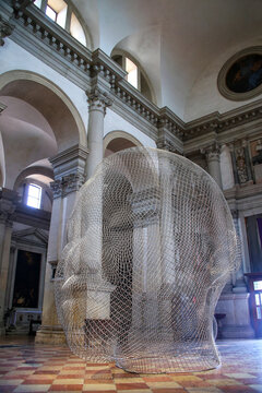 VENICE, ITALY-JUNE 22: Sculptural installation by Jaume Plensa during Venice Art Biennale inside San Giorgio Maggiore church on June 22,2015 in Venice, Italy.The church was built between 1566 and 1610