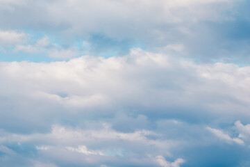 Background of blue sky with white clouds