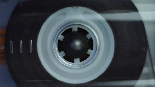 Macro Close Up, Audio Cassette Tape Reel Spinning in Player