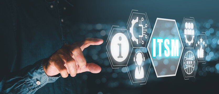 ITSM, information technology service management concept, Business person hand touching information technology service management icon on virtual screen.