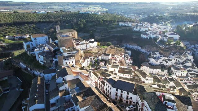 Aerial fly over view above the beautiful village of Setenil de las Bodegas in Spain	