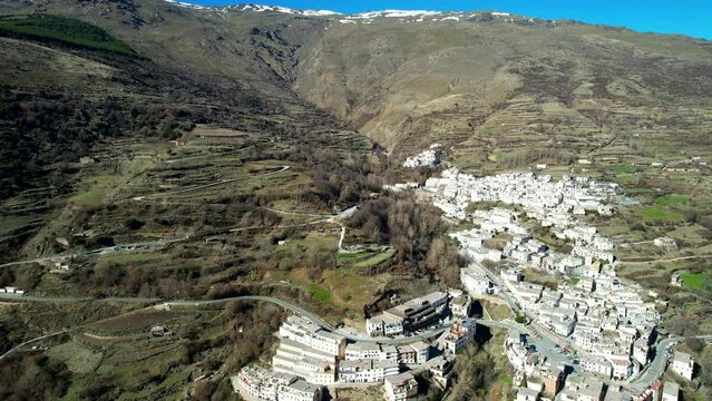 Aerial view above the beautiful village of Capileira in the gorge of the Poqueira in Andalusia Spain	