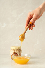 Concept of tasty and sweet food - honey with nuts