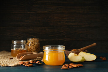 Concept of tasty and sweet food - honey with nuts