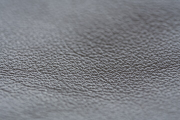 Closeup full grain gray brown leather background