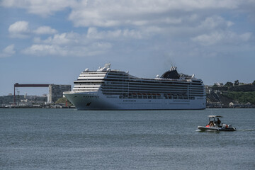 Large modern liner cruiseship cruise ship Poesia, Orchestra, Magnifica or Musica in port of Lisbon,...