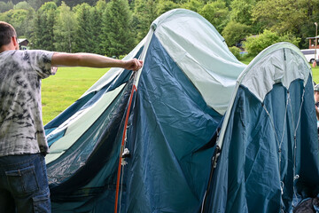 building touristic tent in the forest