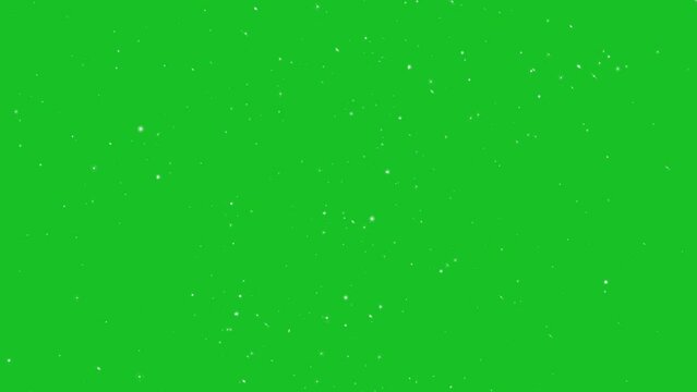 Moving glitter particles on green screen motion graphic effects. 