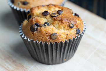 Cupcake with chocolate pieces, close up