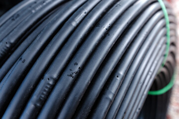 Closeup of drip irrigation tubing in a roll