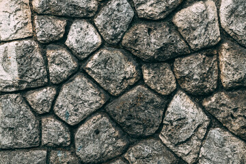 Old stone wall facade pattern as background