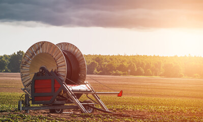 Efficient fields Irrigation. Agricultural Hose Reel Machine Ensuring Water Supply for Healthy Crop...